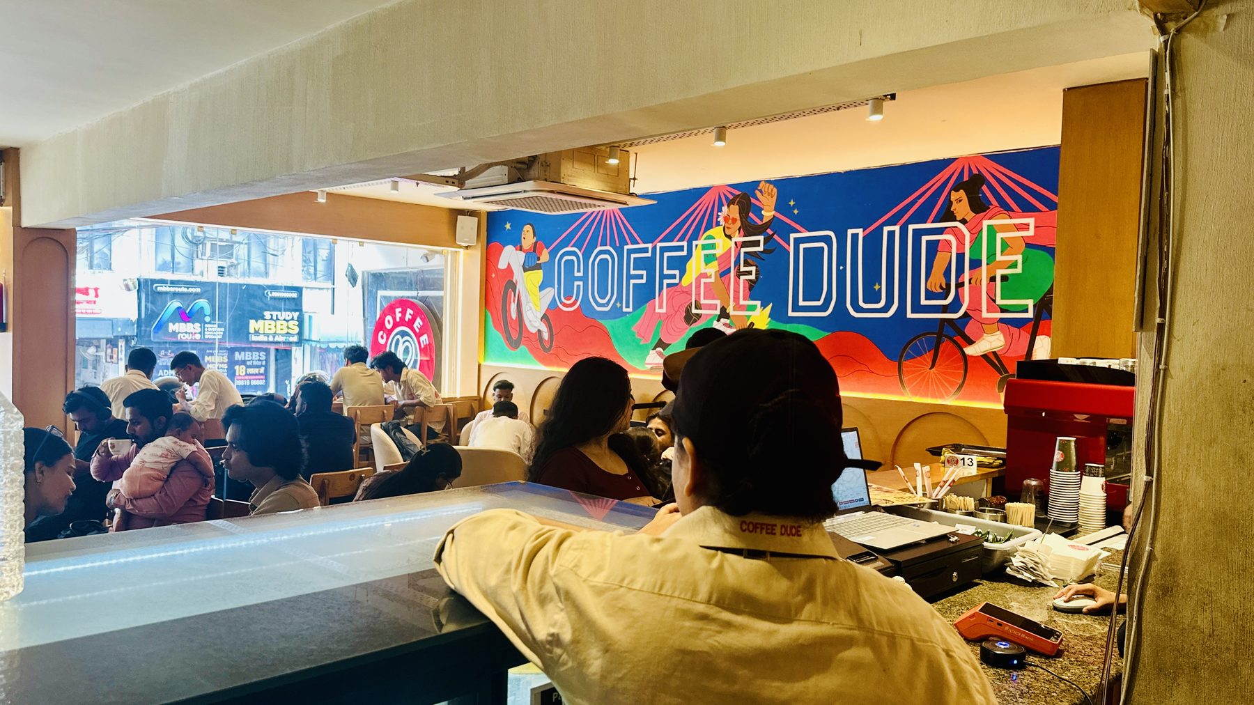 Coffee Dude Hazratganj mural wall